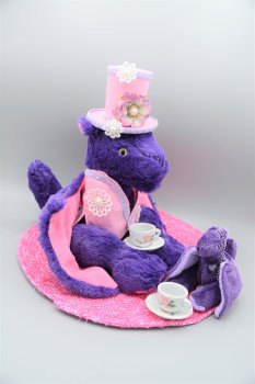 Handmade purple and pink dragon with handmade hat, vest, pocket dragon, two tea cups and saucers and tea mat. Handmade purple and pink dragon with handmade hat, vest, pocket dragon, two tea cups and saucers and tea mat.
